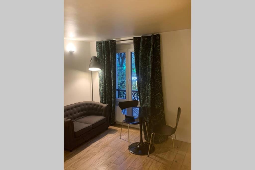 Charming Le Marais Retro Apartment ปารีส ภายนอก รูปภาพ